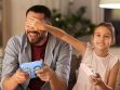 dad and child playing with iQ Magic Bead Puzzle